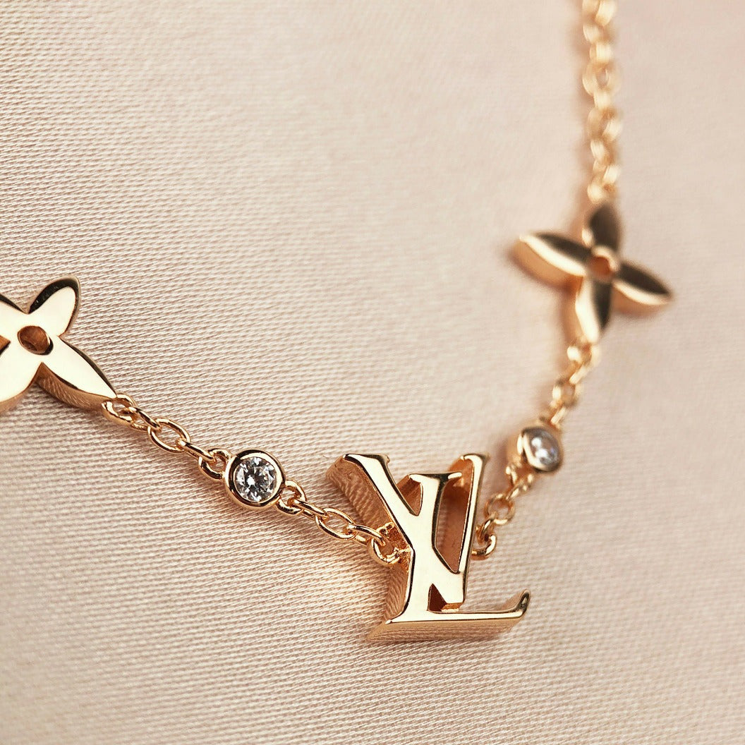 ¡®Twinkle jewelry¡¯STAR AND SUN 7 MOTIFS GOLD BRACELET
