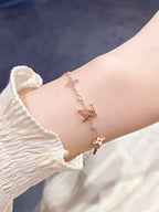 ¡®Twinkle jewelry¡¯STAR AND SUN 7 MOTIFS GOLD BRACELET