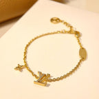 ¡®Twinkle jewelry¡¯LOGO STAR MOTIF GOLD BRACELET