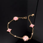 ¡®Twinkle jewelry¡¯STAR AND SUN 4 MOTIF PINK MOP PINK GOLD BRACELET