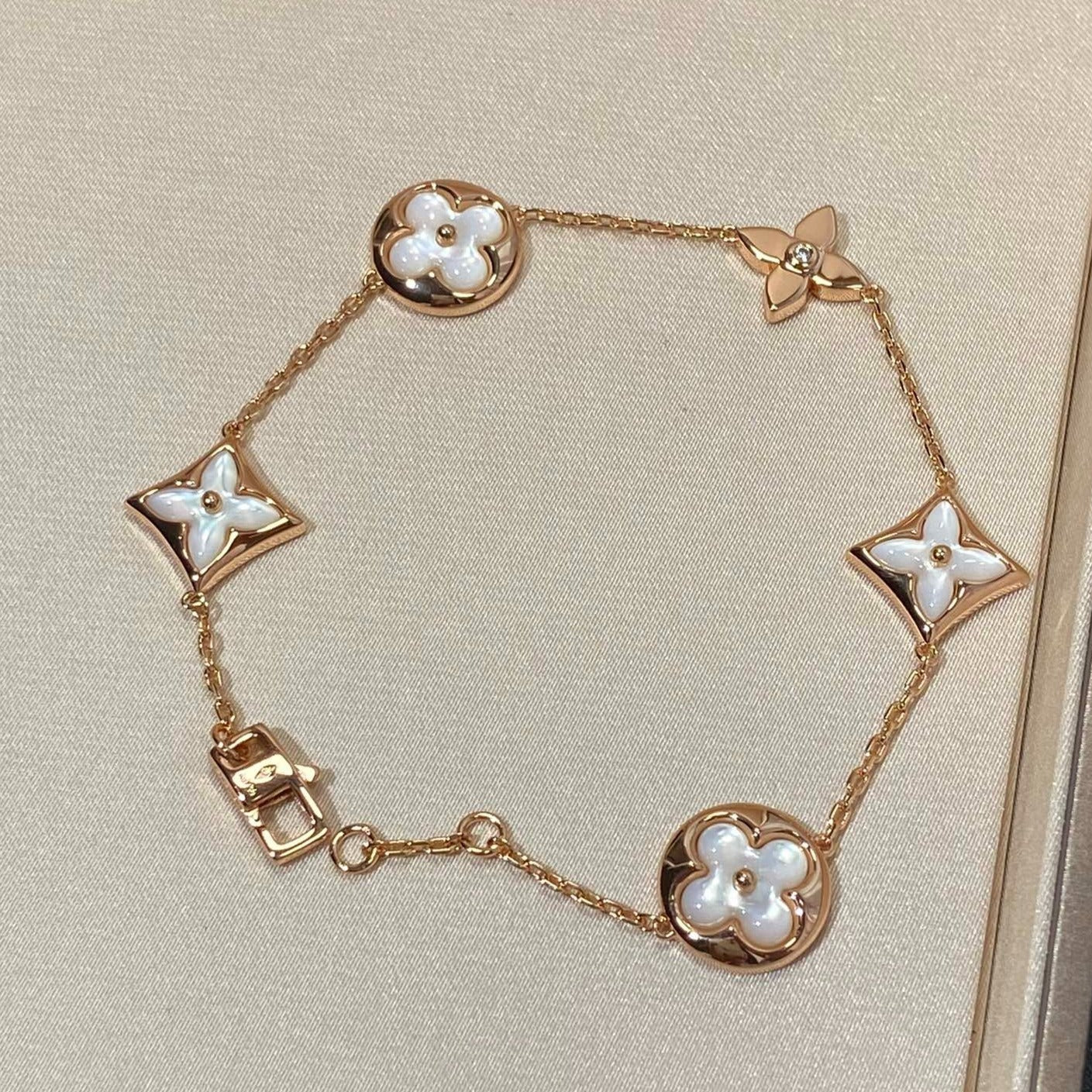 ¡®Twinkle jewelry¡¯STAR AND SUN 5 MOTIF MOP PINK GOLD BRACELET