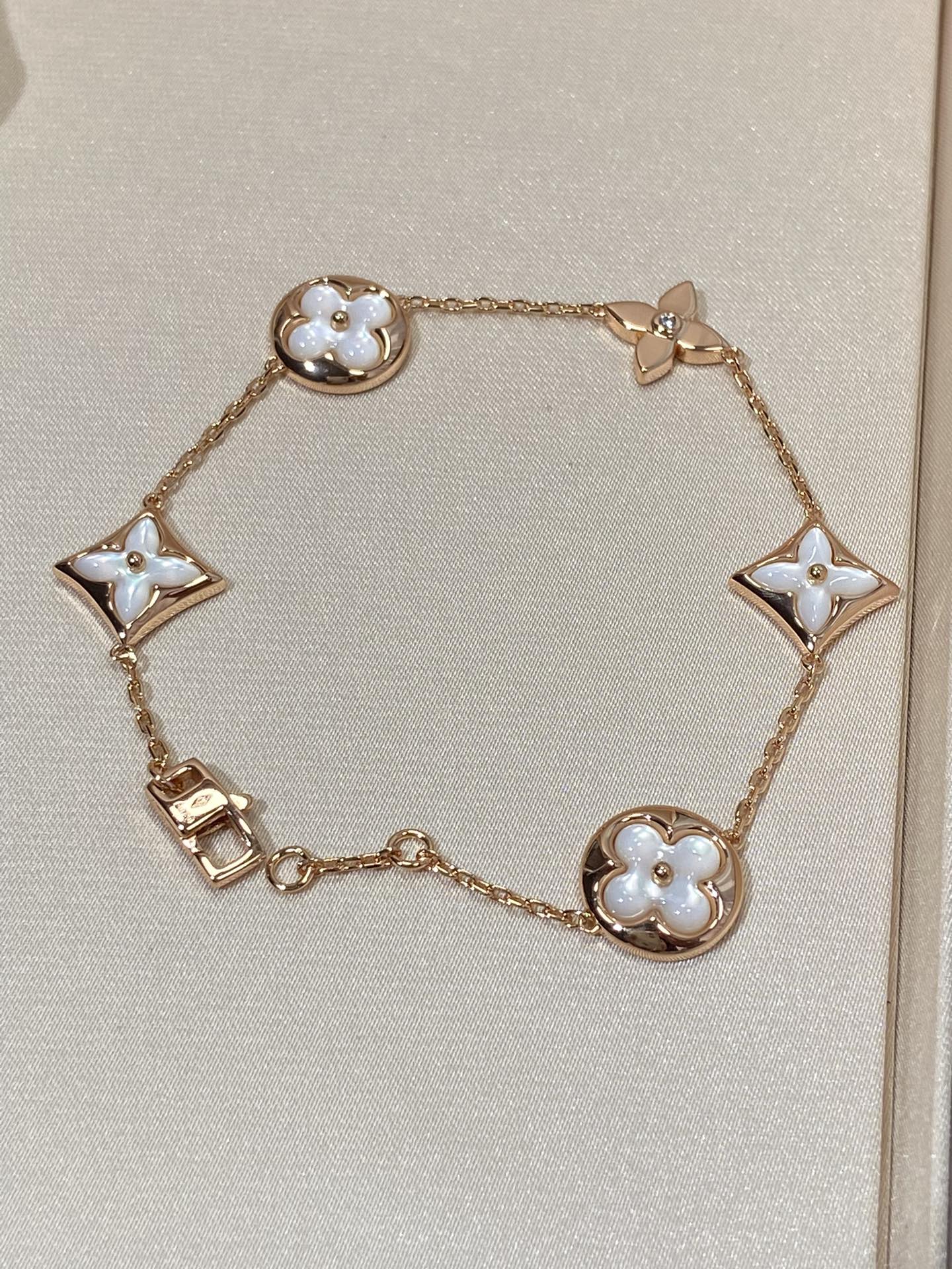 ¡®Twinkle jewelry¡¯STAR AND SUN 5 MOTIF MOP PINK GOLD BRACELET