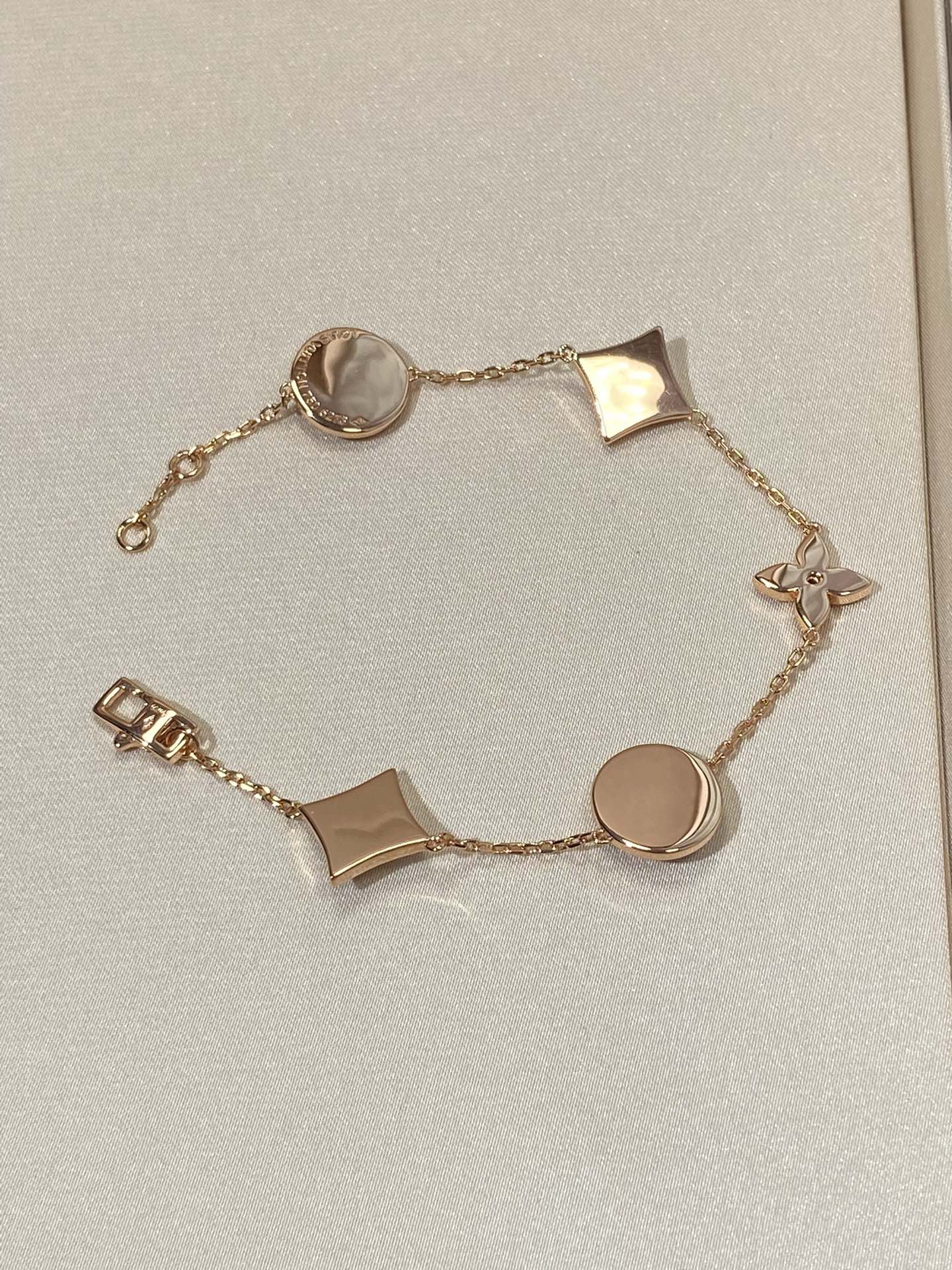 ¡®Twinkle jewelry¡¯STAR AND SUN 5 MOTIF MOP PINK GOLD BRACELET