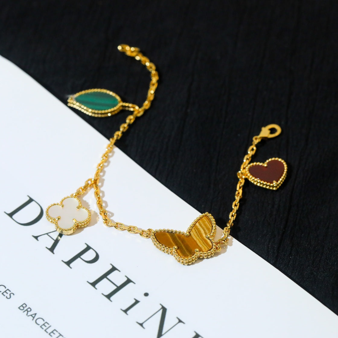 ¡®Twinkle jewelry¡¯LUCKY SPRING 5 MOTIF GOLD BRACELET