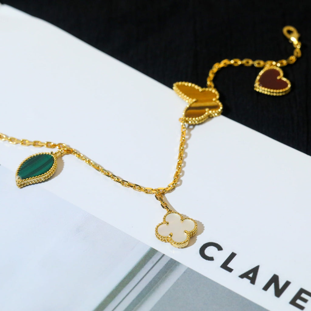 ¡®Twinkle jewelry¡¯LUCKY SPRING 5 MOTIF GOLD BRACELET