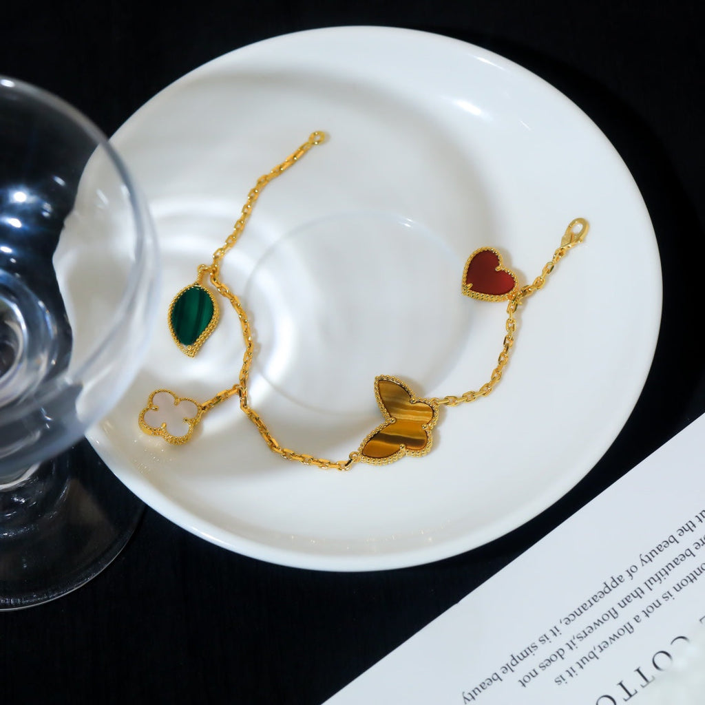 ¡®Twinkle jewelry¡¯LUCKY SPRING 5 MOTIF GOLD BRACELET