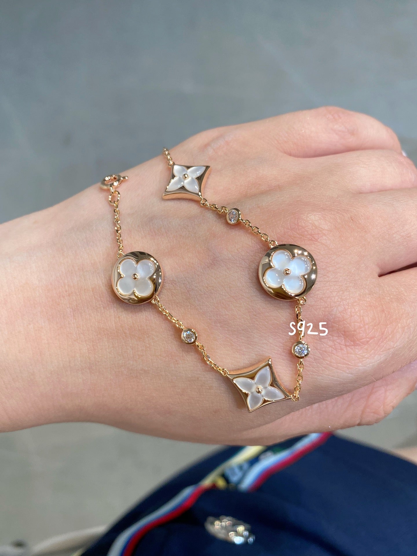 ¡®Twinkle jewelry¡¯STAR AND SUN 4 MOTIF WHITE MOP PINK GOLD BRACELET