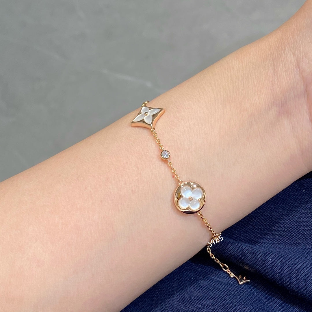¡®Twinkle jewelry¡¯STAR AND SUN 4 MOTIF WHITE MOP PINK GOLD BRACELET