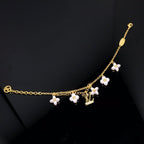 ¡®Twinkle jewelry¡¯LOGO 6 MOTIF STAR AND SUN GOLD BRACELET