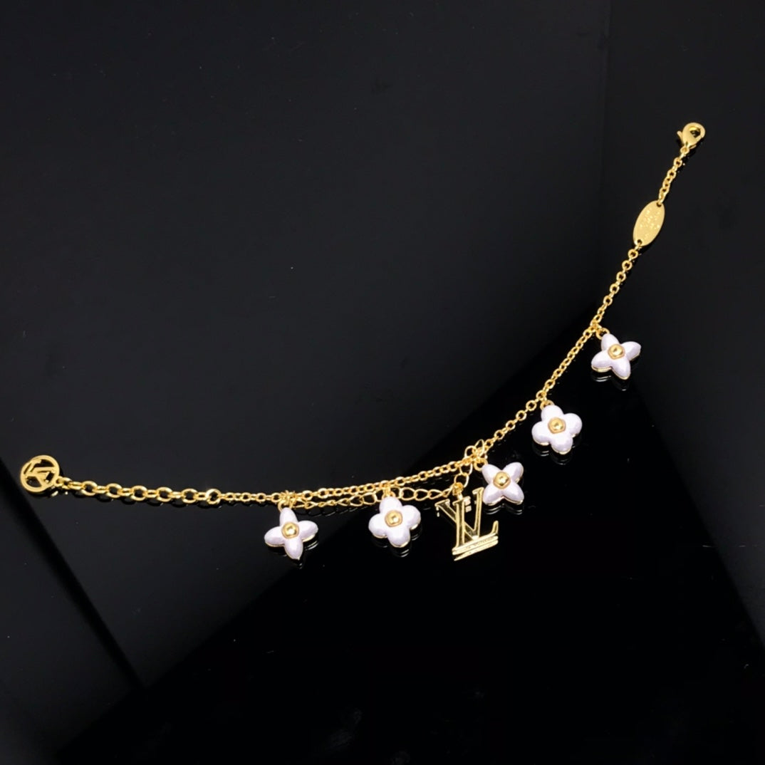 ¡®Twinkle jewelry¡¯LOGO 6 MOTIF STAR AND SUN GOLD BRACELET