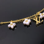 ¡®Twinkle jewelry¡¯LOGO 6 MOTIF STAR AND SUN GOLD BRACELET