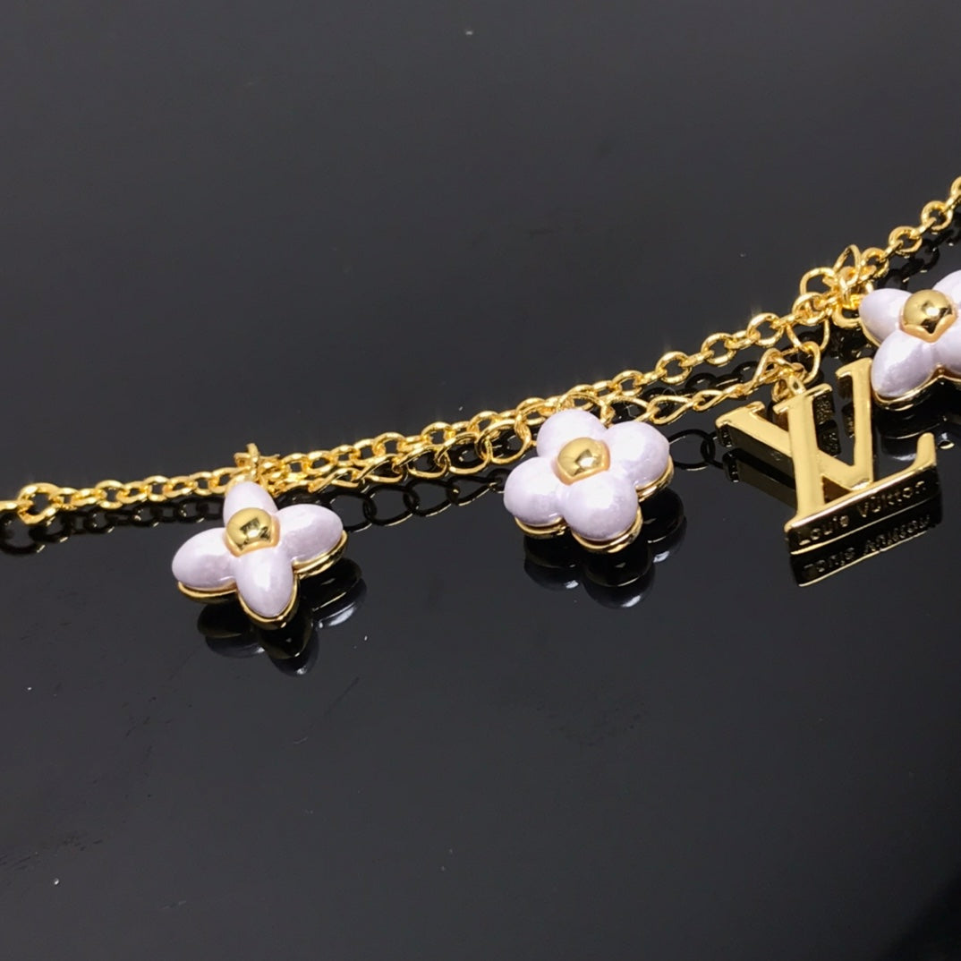 ¡®Twinkle jewelry¡¯LOGO 6 MOTIF STAR AND SUN GOLD BRACELET