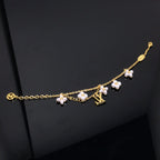 ¡®Twinkle jewelry¡¯LOGO 6 MOTIF STAR AND SUN GOLD BRACELET