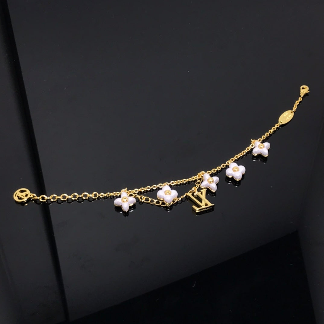 ¡®Twinkle jewelry¡¯LOGO 6 MOTIF STAR AND SUN GOLD BRACELET