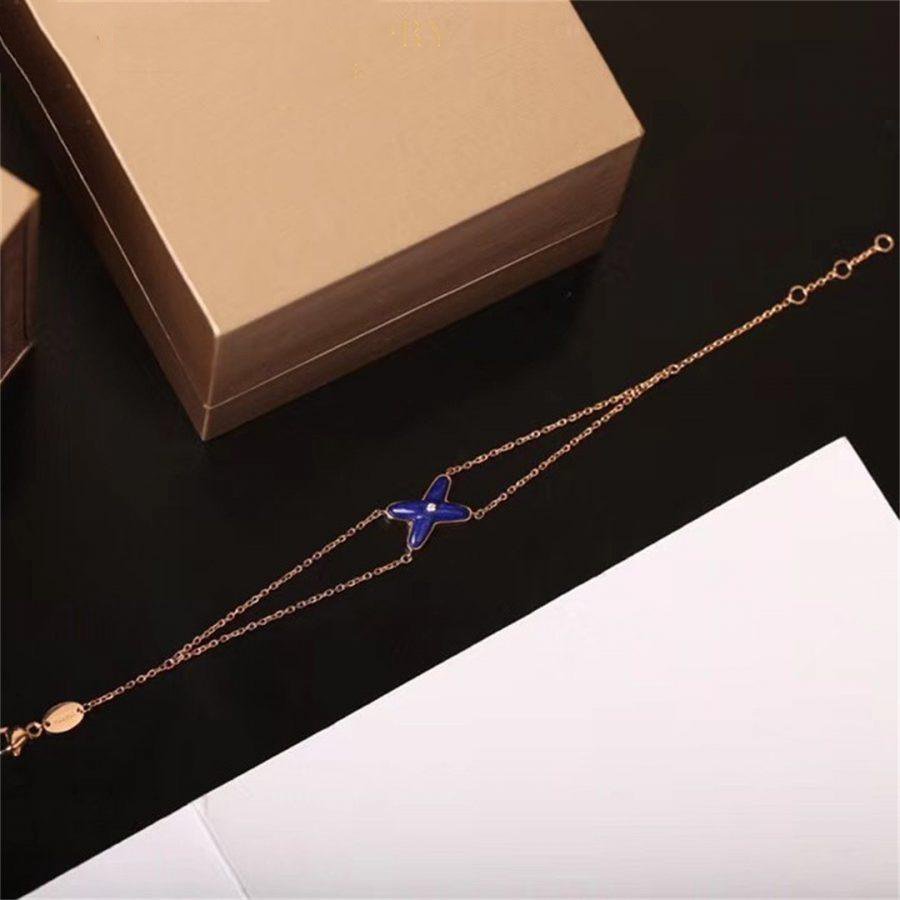 ¡®Twinkle jewelry¡¯Hollow Design Four-Leaf Clover Flower Shape Ring