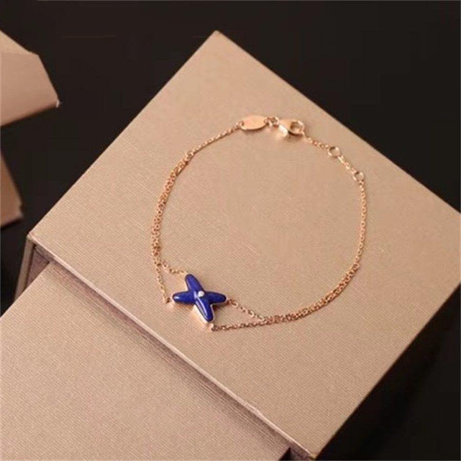 ¡®Twinkle jewelry¡¯Hollow Design Four-Leaf Clover Flower Shape Ring