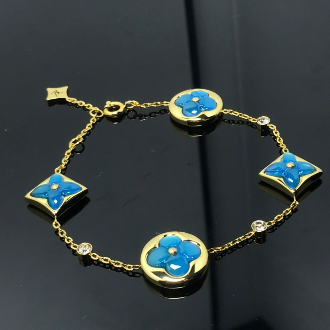 ¡®Twinkle jewelry¡¯STAR AND SUN 4 MOTIF BLUE BRACELET