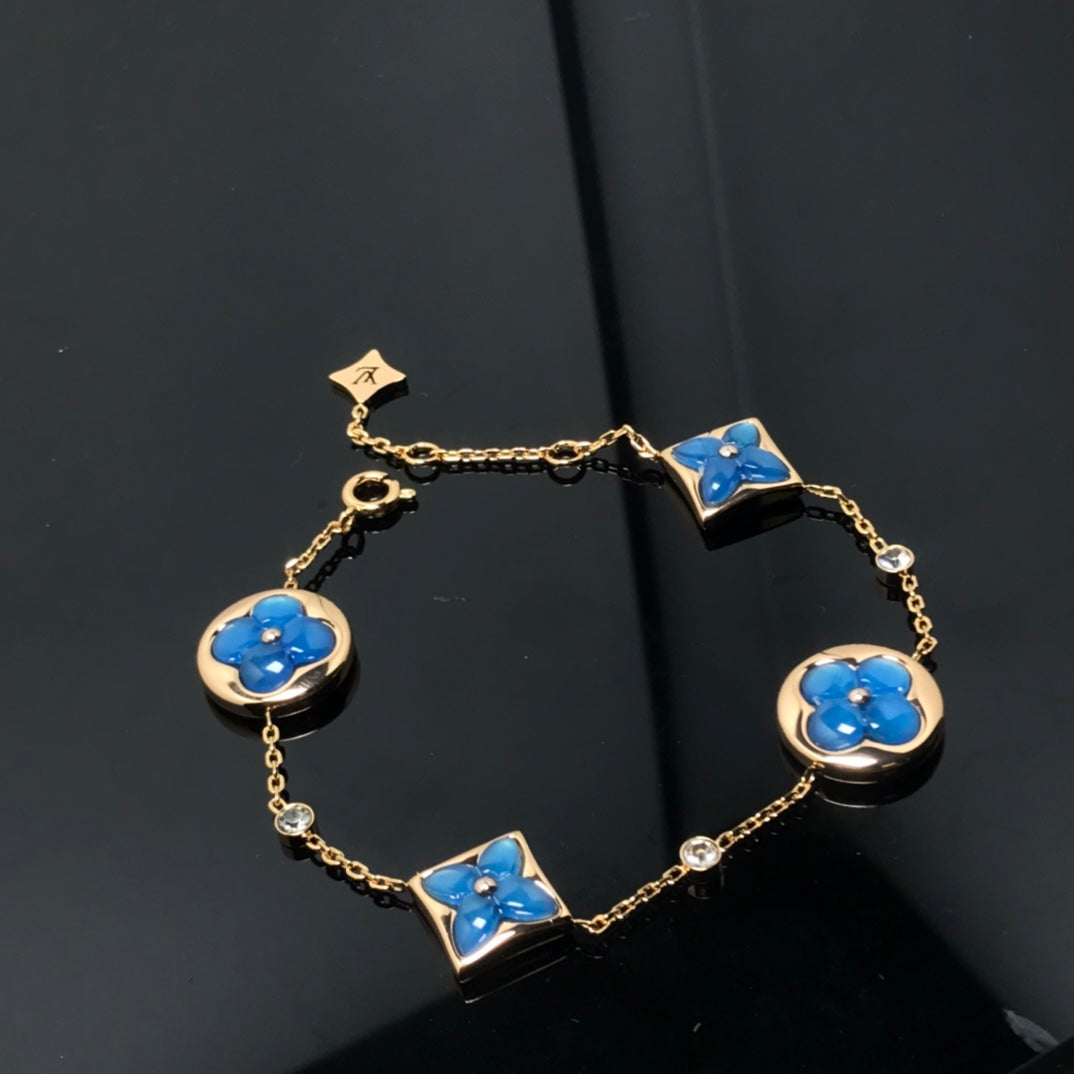 ¡®Twinkle jewelry¡¯STAR AND SUN 4 MOTIF BLUE BRACELET